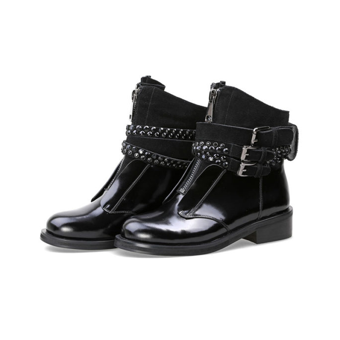 picture of 2 black motorcycle punk style boots with buckles on them from the right view