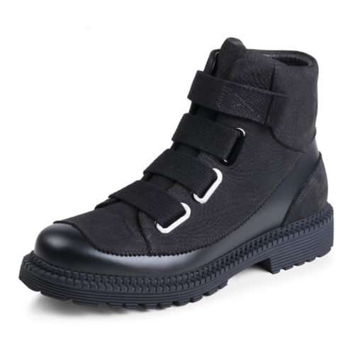 picture of black leather high top combat boot shots with fashion straps on the front of them