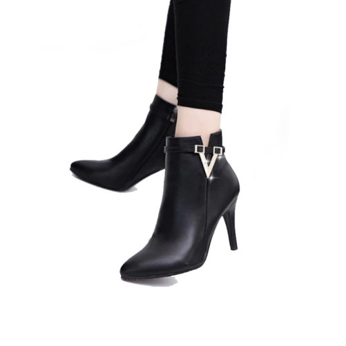 picture of a girl wearing sexy stiletto high heel ankle boots with a v buckle